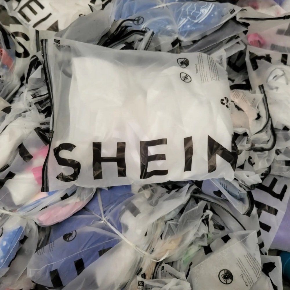 Women’s clothes  from SHEIN new assorted sizes and styles 50 piece of women’s .